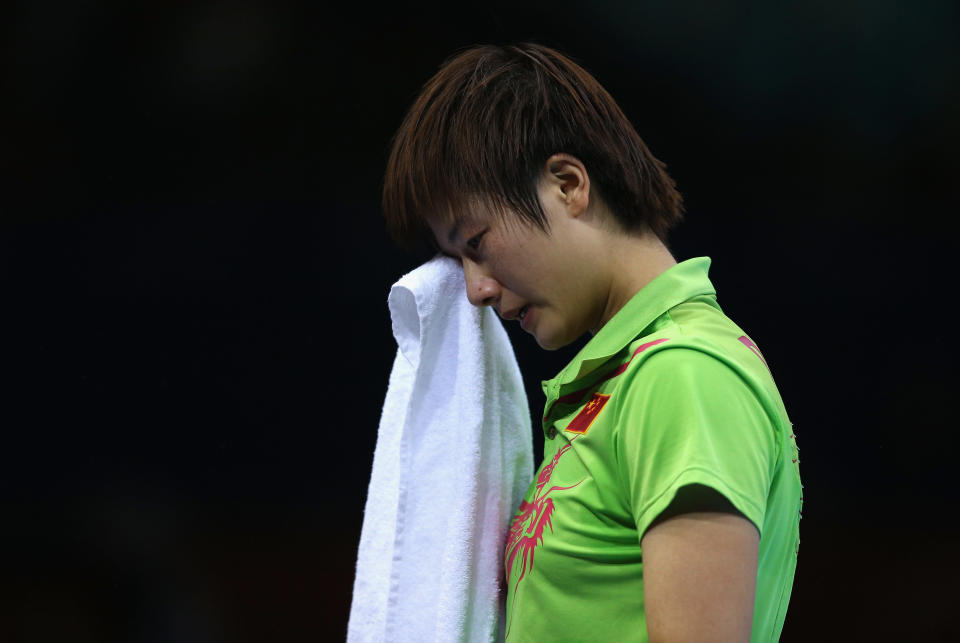 <b>Table tennis final controversy:</b> Li Xiaoxia of China beat teammate Ding Ning in a controversial Olympic women's singles table tennis final. The fourth game saw controversy that reduced Ding Ning to tears and effectively ended her challenge. With Li 8-2 up, Ding was shown a red card for dissent after approaching the umpire about a serve fault.<br><br> <a href="http://in.news.yahoo.com/chinese-li-takes-tt-gold-controversial-final-170719846.html " data-ylk="slk:Li takes TT gold in controversial final;elm:context_link;itc:0;sec:content-canvas;outcm:mb_qualified_link;_E:mb_qualified_link;ct:story;" class="link  yahoo-link">Li takes TT gold in controversial final</a>