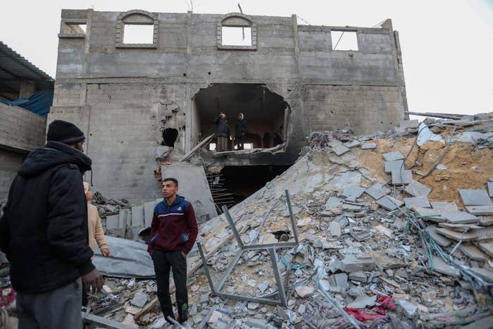 Palestinians amid the rubble