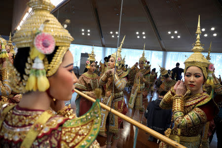 Dancers get ready backstage before a performance of masked theatre known as Khon which was recently listed by UNESCO, the United Nations' cultural agency, as an intangible cultural heritage, along with neighbouring Cambodia's version of the dance, known as Lakhon Khol at the Thailand Cultural Centre in Bangkok, Thailand November 7, 2018. REUTERS/Athit Perawongmetha