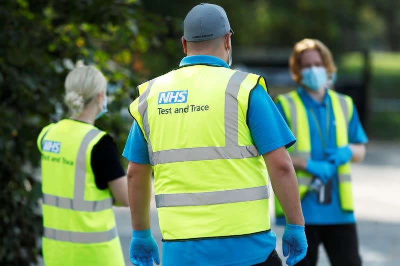 FILE PHOTO: NHS Test and Trace workers are seen at a test station in Richmond-Upon-Thames