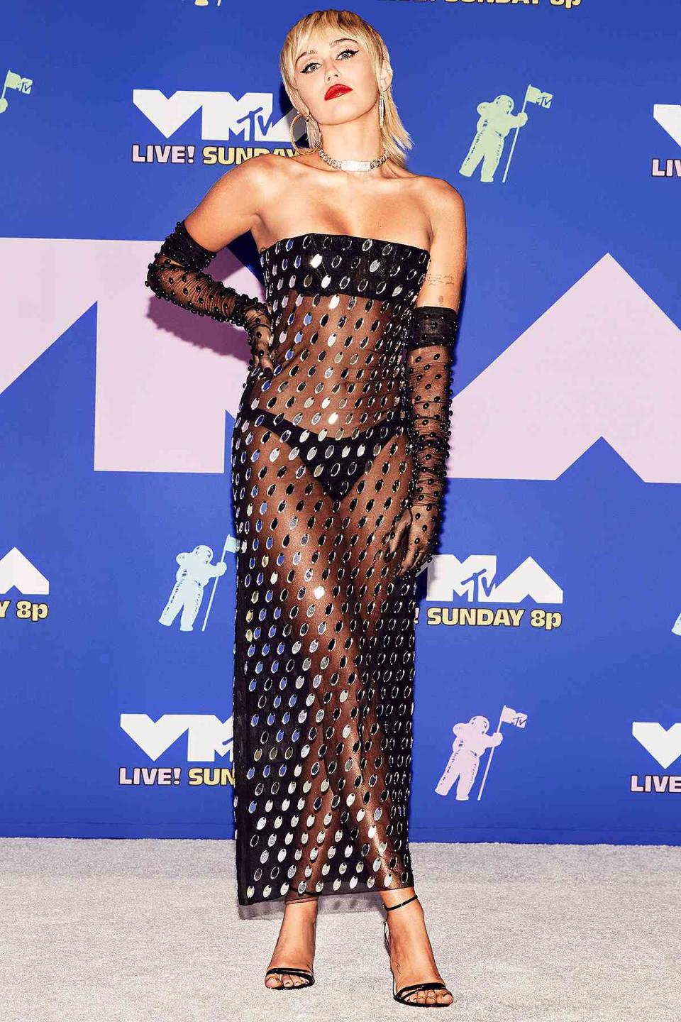 <p>in an embellished sheer Mugler strapless gown with matching gloves at the 2020 MTV VMAs. </p>