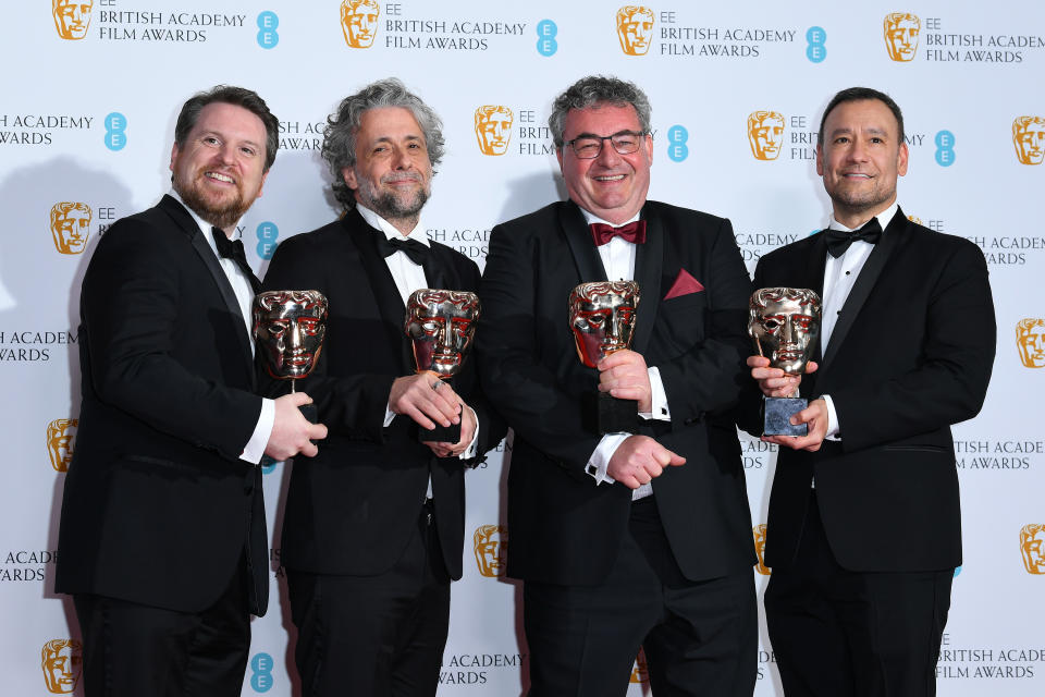 LONDON, ENGLAND - MARCH 13: Brian Connor, Gerd Nefzer, Paul Lambert and Tristan Myles pose in the winners room with the award for special visual effects during the EE British Academy Film Awards 2022 at Royal Albert Hall on March 13, 2022 in London, England. (Photo by Joe Maher/Getty Images)