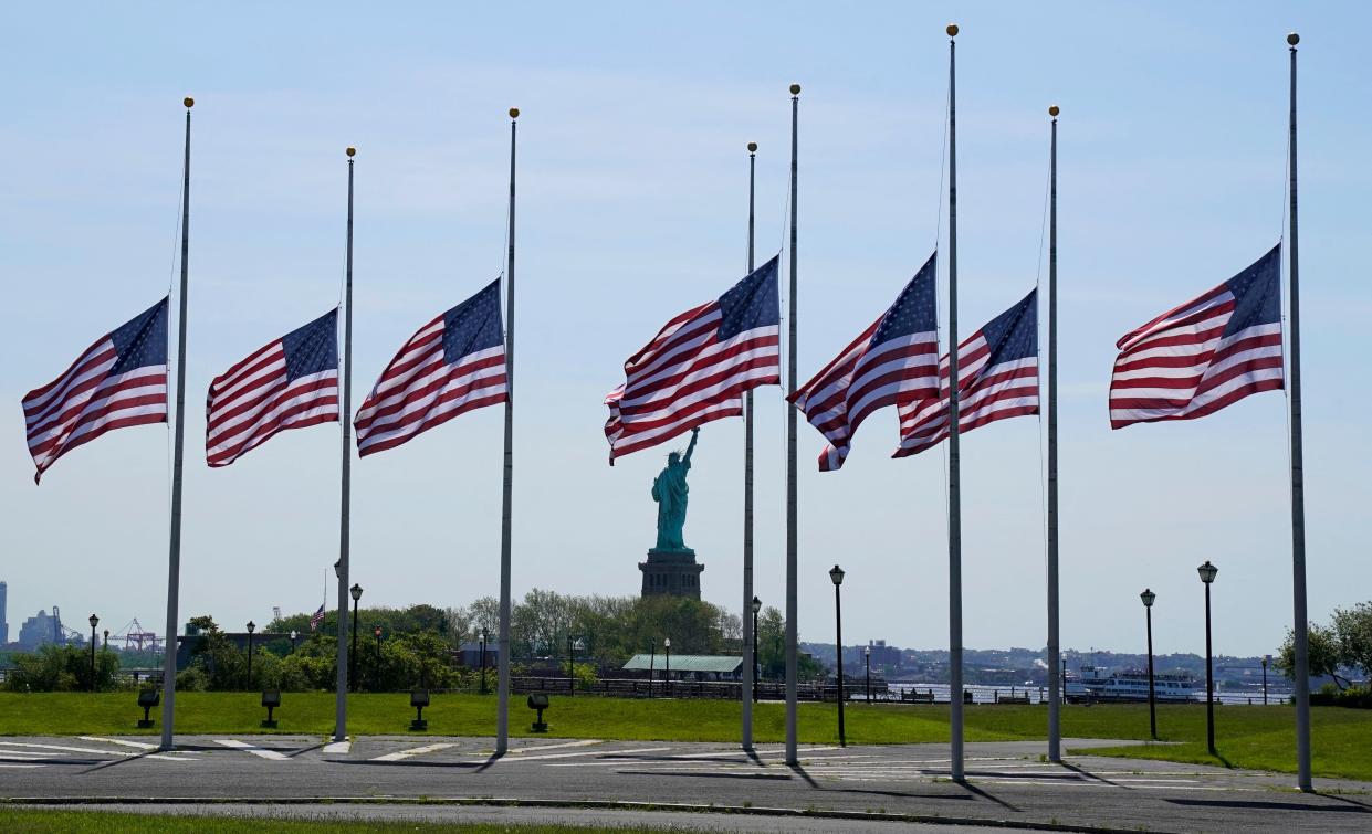 Flags fly at half-mast at Liberty State Park in Jersey City, N.J., in honor of the victims. 