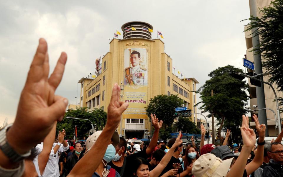 Anti-monarchy protests have taken off recently, with demonstrators giving the three-finger salute - REUTERS/Jorge Silva/File photo