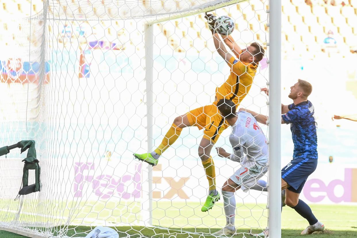 Martin Dubravka fumbles the ball into his net (AP)