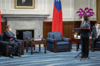 In this photo released by the Taiwan Presidential Office, Taiwan's President Tsai Ing-wen meets a Japanese delegation led by lawmaker and former Defense Minister Shigeru Ishiba, left, at the presidential office in Taipei, Taiwan on Thursday, July 28, 2022. The group of Japanese lawmakers including two former defense ministers met with Taiwan's president on Thursday in a rare high-level visit to discuss regional security. (Taiwan Presidential Office via AP)