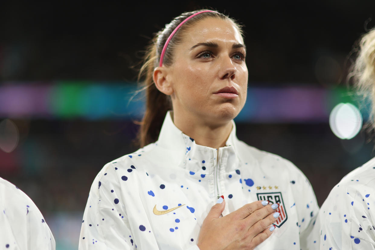 Morgan lines up for the National Anthem during last summer's world Cup. (Alex Pantling/FIFA via Getty Images)