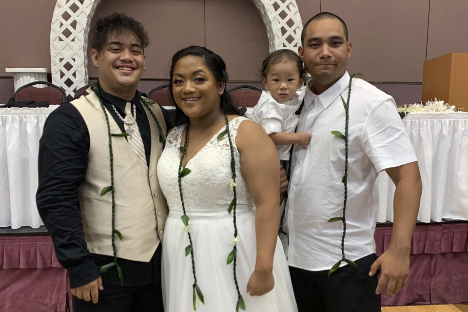 Po’omaika’i Estores-Losano, right, with his sister Ku’ulei Barut on her wedding day in September 2019. He remains missing nearly two weeks after the Aug. 8, 2023, fire in Lahaina, Hawaii The number of people still missing has dwindled after more families have found once-missing loved ones. But the number of missing remains substantial. (Photo courtesy of Leona Castillo)