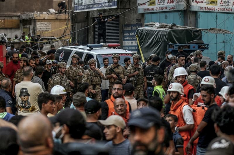 Lebanese army soldiers are deployed at the site where a building was hit by an Israeli airstrike in Beirut southern suburb. According to the Lebanese Ministry of Health, six people were killed and 15 others were wounded in the strike, which was targeting Hezbollah's rocket chief, according to the Israeli military. Marwan Naamani/dpa