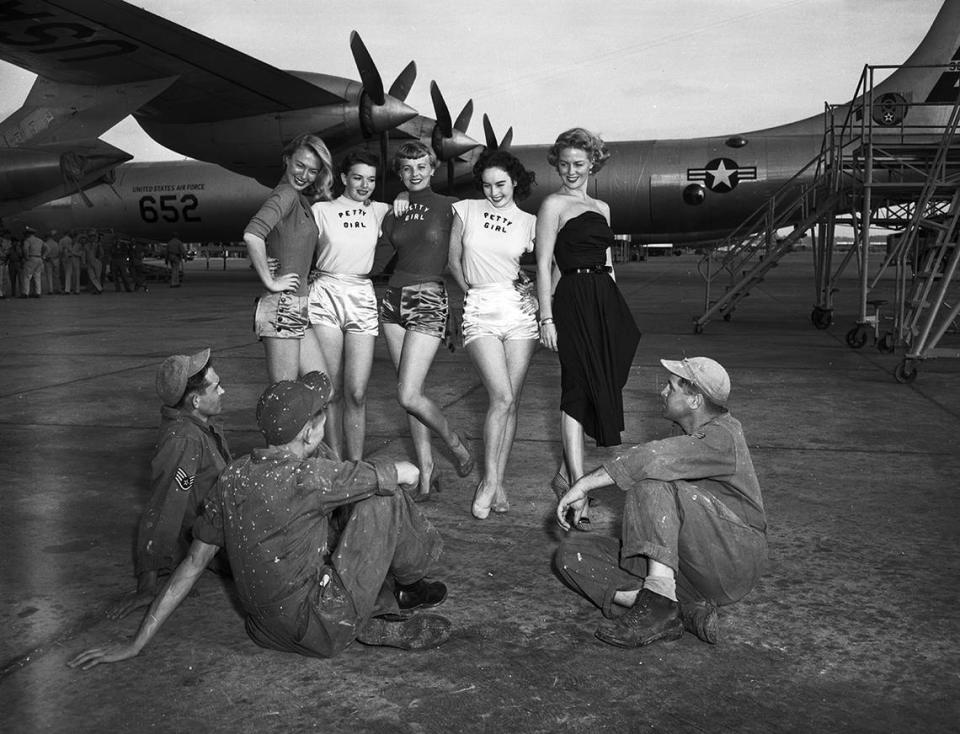 Oct. 4, 1950: “Work was virtually at a standstill on Carswell Air Base’s flight line for Sgt. James Hamilton, left, and Staff Sgt. Arthur Botten. Reason was Petty Girls Barbara Freking, Shirley Ballard, Dorothy Abbott and Mona Knox and movie star Janis Carter who visited in connection with personal appearance at the Hollywood Theater in Fort Worth.” Fort Worth Star-Telegram archives/UT Arlington Special Collections