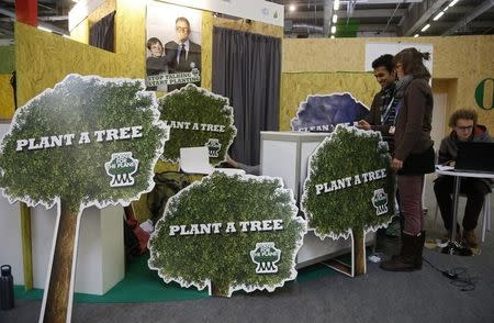 Plant for the Planet Foundation members speak together during the World Climate Change Conference 2015 (COP21) in Le Bourget, near Paris, France, December 3, 2015. REUTERS/Jacky Naegelen