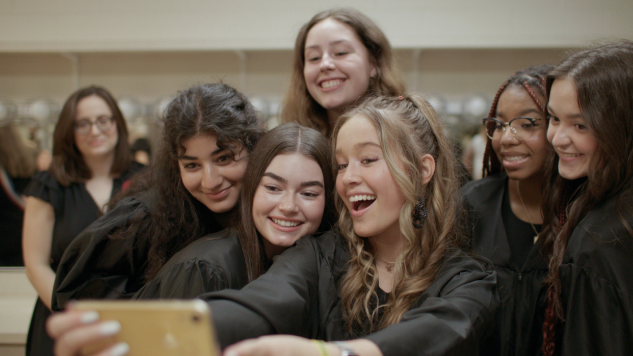 a group of women smiling