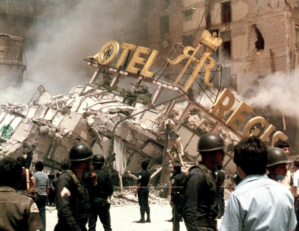 The Hotel Regis in Mexico City's central Alameda park square collapses after an earthquake in this September 19, 1985 file photo. The 1985 Mexico City earthquake, measuring a giddy 8.1 on the Richter scale, caught Mexico off guard, killing thousands as it toppled housing blocks and office buildings in a city built on the soft mud left by a dried-up pre-Hispanic lake.Some 12,000 people are believed to have died in this earthquake, with another 40,000 injured. President Vicente Fox will host a memorial service on September 19, 2005 for the victims as the country marks the quake's 20th anniversary. REUTERS/Daniel Aguilar/File  DA/VP