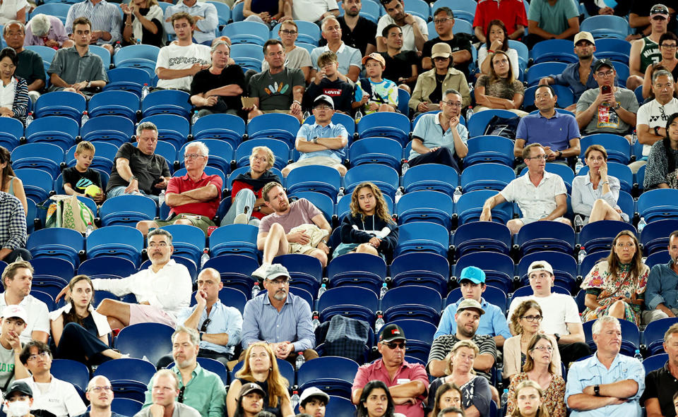 Fans at the Australian Open amid empty seats.