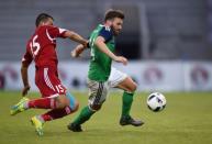 Football Soccer - Northern Ireland v Belarus - International Friendly - Windsor Park, Belfast, Northern Ireland - 27/5/16 Northern Ireland's Stuart Dallas in action with Belarus' Sergei Kislyak Reuters / Clodagh Kilcoyne