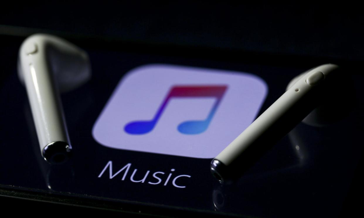 <span>Spotify argues that restrictions benefit the tech company’s rival app, Apple Music.</span><span>Photograph: Anadolu Agency/Getty Images</span>
