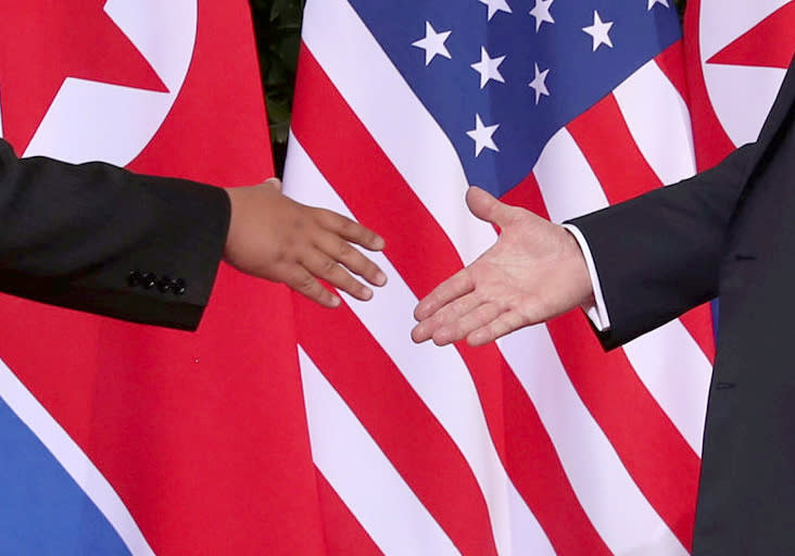 <p>President Donald Trump shakes hands with North Korean leader Kim Jong Un at the Capella Hotel on Sentosa island in Singapore June 12, 2018. (Photo: Jonathan Ernst/Reuters) </p>