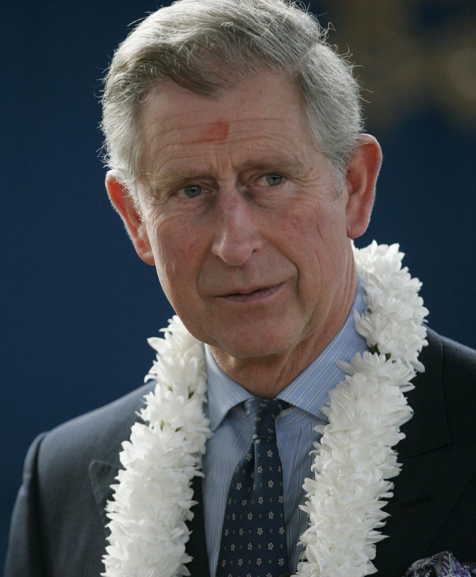 FILE - Britain's Prince Charles watches school children perform at at the Sri Swaminarayan Mandir school, a Hindu school, during celebrations of the Hindu festival of Holi, in London, Wednesday, March, 2009. At a time when religion is fueling tensions around the world, from Hindu nationalists in India to Jewish settlers in the West Bank and fundamentalist Christians in the United States, King Charles III is trying to bridge the differences between the faith groups that make up Britain’s increasingly diverse society. (AP Photo/Alastair Grant, File)