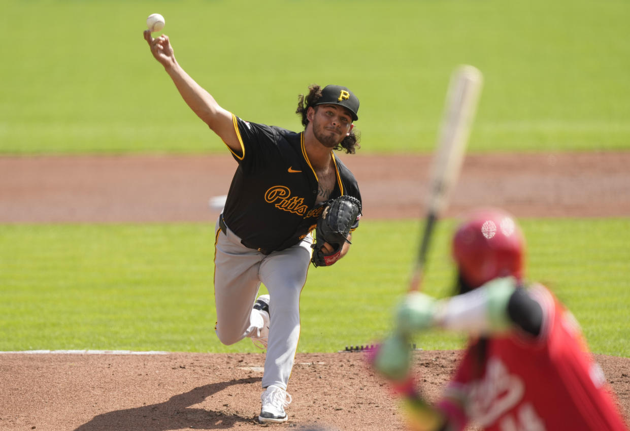 Pittsburgh Pirates starting pitcher Jared Jones throws during the first inning of a baseball game against the Cincinnati Reds, Saturday, Sept. 21, 2024, in Cincinnati. (AP Photo/Carolyn Kaster)