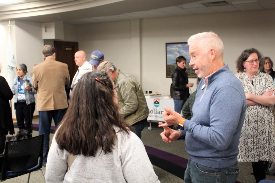 Holland Mayor Nathan Bocks speaks to residents during a ballot question open house Wednesday, April 26.