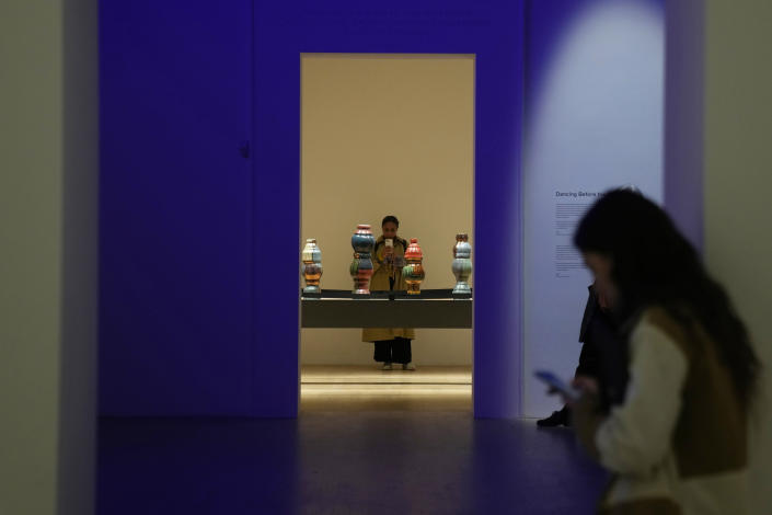 Women visit installations at the Great Britain pavilion, at the Biennale International Architecture exhibition, in Venice, Italy, Wednesday, May 17, 2023. The 18th edition of the Biennale International Architecture exhibition will open to the public from Saturday May 20 to Sunday Nov. 26, 2023. (AP Photo/Antonio Calanni)