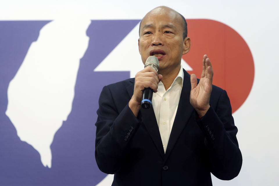 Han Kuo-yu of the Nationalist Party speaks during a media event announcing his campaign logo in Taipei, Taiwan, Thursday, Nov. 14, 2019. The China-friendly opposition candidate in Taiwan’s upcoming presidential election is urging Hong Kong to adopt universal suffrage as the best way of stemming months of anti-government protests. (AP Photo/Chiang Ying-ying)