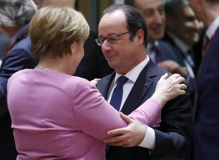 German Chancellor Angela Merkel and French President Francois Hollande attend the EU summit in Brussels, Belgium, March 9, 2017. REUTERS/Yves Herman