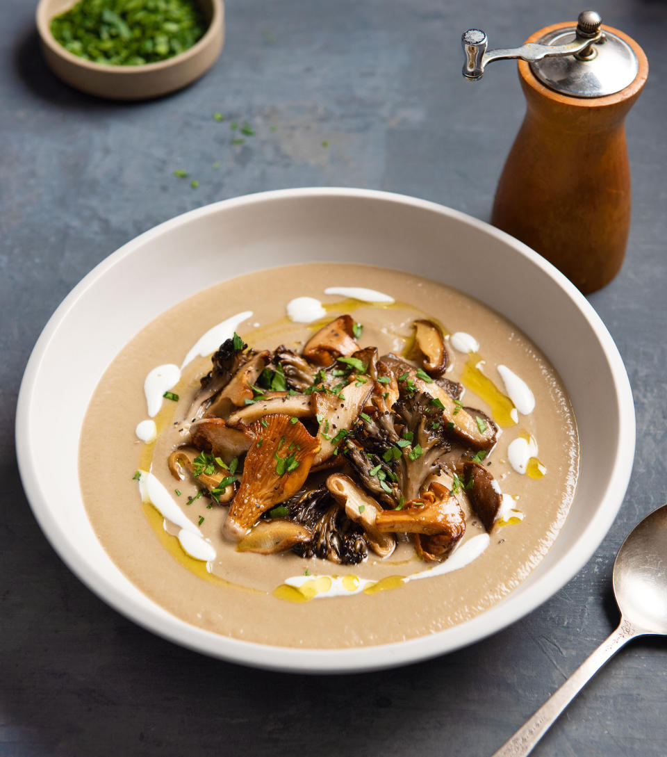 This image released by Houghton Mifflin Harcourt shows a wild mushroom soup recipe, inspired by an episode of "Seinfeld," from the cookbook, "Binging with Babish: 100 Recipes Recreated from Your Favorite Movies and TV Shows," by Andrew Rea. (Evan Sung/Houghton Mifflin Harcourt via AP)