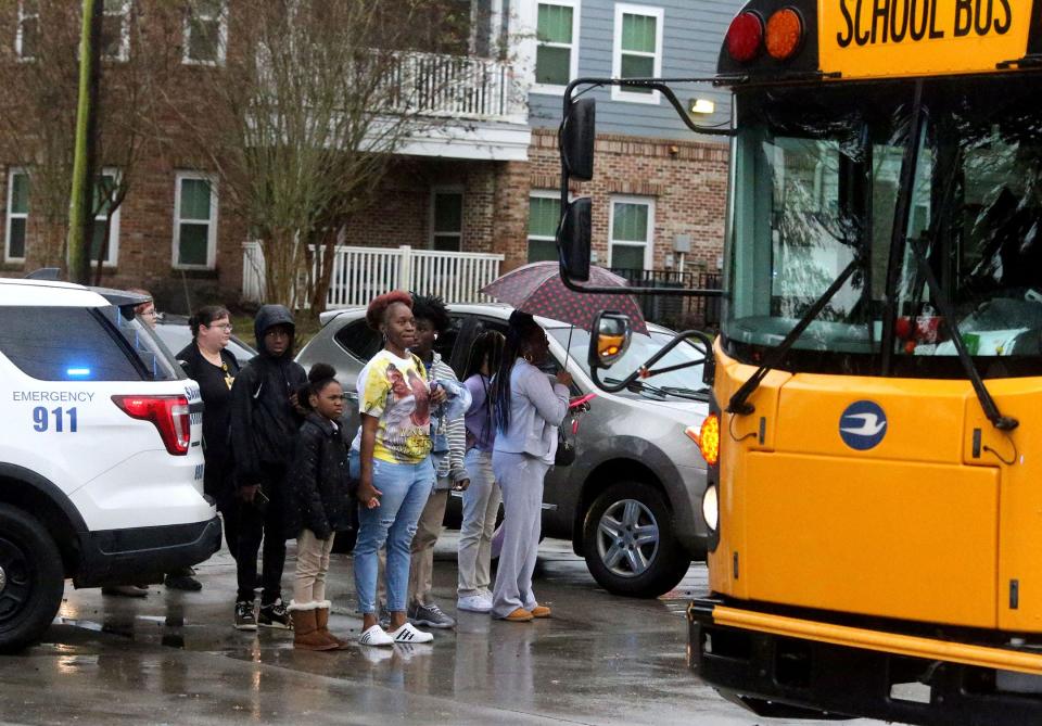 Families leave with their students following a lockdown on Wednesday November 30, 2022 at Savannah High.