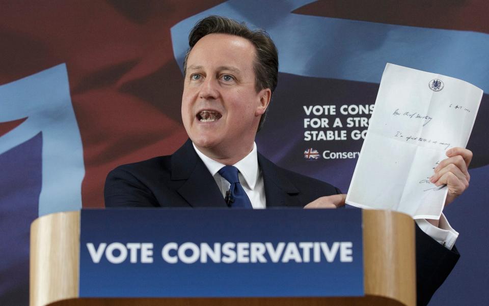 Then-PM David Cameron holds up Byrne's notorious note in 2015