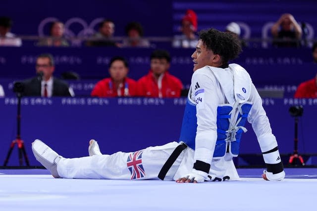 Caden Cunningham reacts after losing in the Olympic final