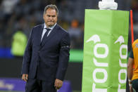 Australia's rugby coach Dave Rennie watches his players warm-up ahead the rugby international between England and the Wallabies in Perth, Australia, Saturday, July 2, 2022. (AP Photo/Gary Day)