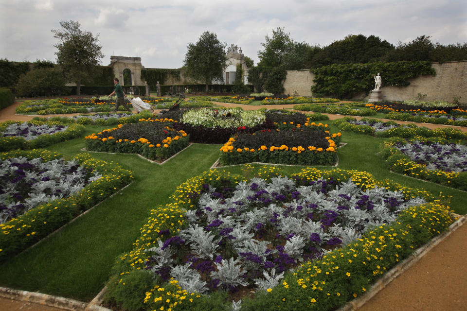 Workers put finishing touches to the Italian Gardens at Wrest Park. English Heritage has recently finished a lengthy restoration process around the grounds of the park, which sits on 92 acres of historic landscape gardens in Bedfordshire. For decades, the overgrown gardens and 18th century mansion and pavillion have been behind closed doors, and remained largely unknown to the public.