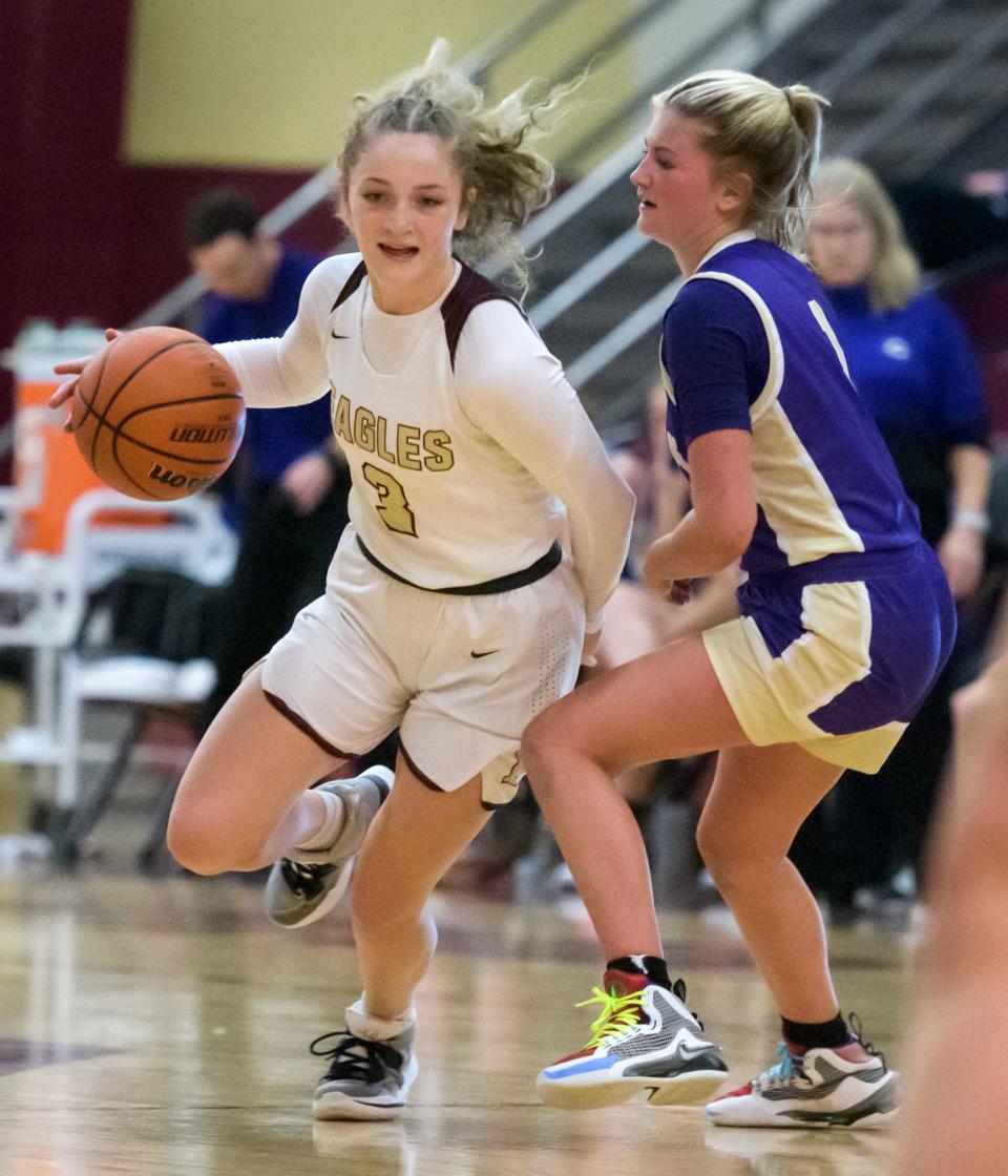 Dunlap's Julia Sollberge (3) moves the ball against Canton's Ava Wenger in the second half Thursday, Dec. 15, 2022 at Dunlap High School. The Eagles defeated the Little Giants 68-53.