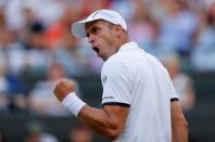 Tennis - Wimbledon - London, Britain - July 10, 2017 Luxembourg’s Gilles Muller celebrates during his fourth round match against Spain’s Rafael Nadal REUTERS/Matthew Childs