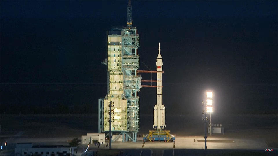 The Long March 2F rocket and Shenzhou 18 spacecraft await launch at the Jiuquan Satellite Launch Center in northwest China.  / Credit: CCTV