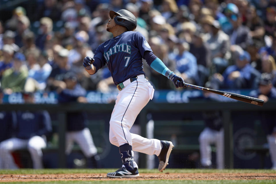 Seattle Mariners' Jorge Polanco hits an RBI single against the Atlanta Braves during the fifth inning of a baseball game, Wednesday, May 1, 2024, in Seattle. (AP Photo/John Froschauer)
