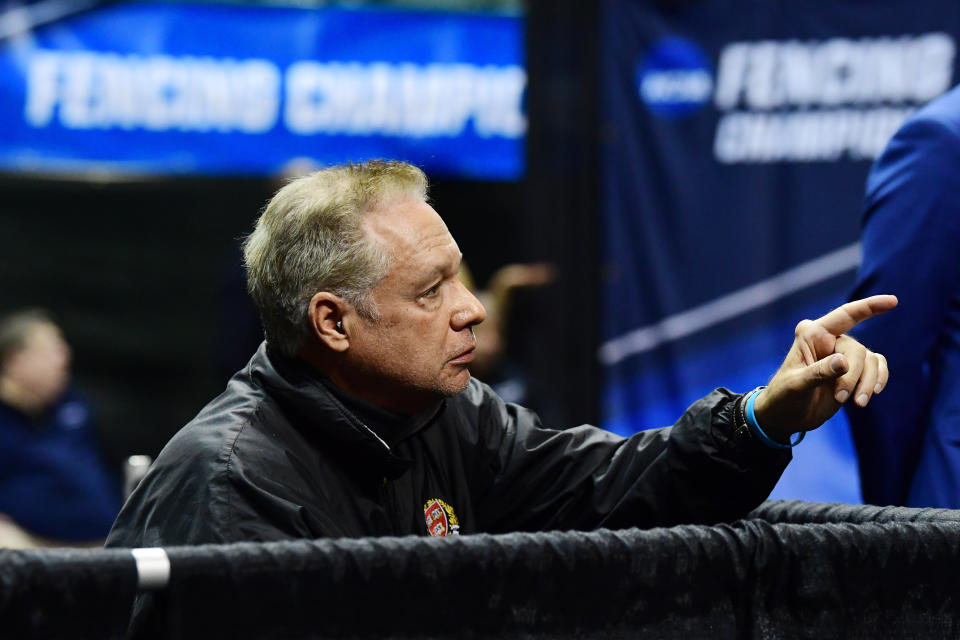 Head coach Peter Brand talks to a Harvard fencer during the Division I Women's Fencing Championship held at The Wolstein Center on the Cleveland State University campus on March 24, 2019 in Cleveland, Ohio. (Getty)