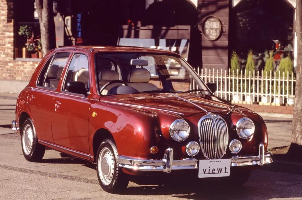 <p>Since its release in 1993, the Viewt had people bewildered: “Is that a 1963 MkII Jag?”. Not quite. It almost looked like one from the front but that was Mitsouka's intention. If you were to lift off the glinty bodywork, you’d be met with a Nissan Micra or March as it was known in Japan. </p><p>By looking through the windows, you’d quickly notice that the interior had nothing to do with the Jaguar’s either. Those interested could have a 1.0-litre or a 1.3-litre in either a manual or automatic. The Viewt was never sold in the UK but found its way to UK soil via importers.</p>