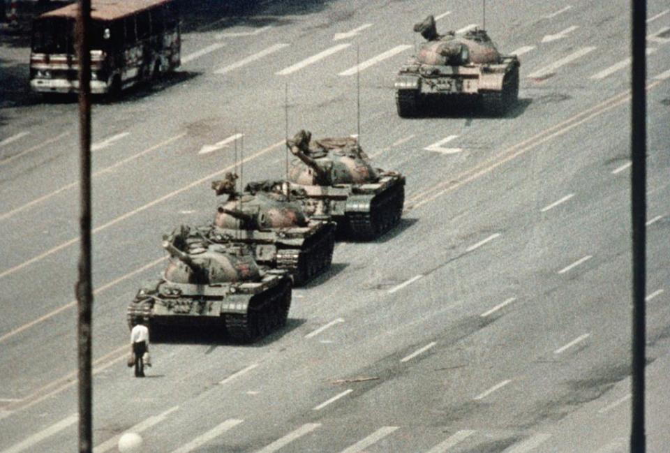 <p>In perhaps the most memorable moment during the 1989 Tiananmen Square protects, recollections of the event vary. Some say the unidentified man known as "<a href="https://www.cnn.com/interactive/2019/05/world/tiananmen-square-tank-man-cnnphotos/" rel="nofollow noopener" target="_blank" data-ylk="slk:Tank Man;elm:context_link;itc:0;sec:content-canvas" class="link ">Tank Man</a>" was run over and killed, but <a href="https://www.youtube.com/watch?v=YeFzeNAHEhU" rel="nofollow noopener" target="_blank" data-ylk="slk:other videos;elm:context_link;itc:0;sec:content-canvas" class="link ">other videos</a> show him moving away from the scene.</p>