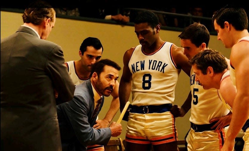 Jeremy Piven, portraying New York Knicks coach Joe Lapchick, stars with Everett Osborne (in uniform number 8) in the movie "Sweetwater," directed by former Burlington resident Martin Guigui.