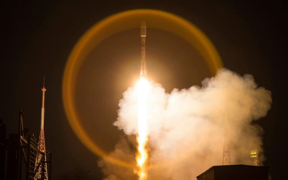 A Soyuz-2.1b launch vehicle takes-off with another 34 OneWeb satellites from the Baikonur Cosmodrome in Kazakhstan