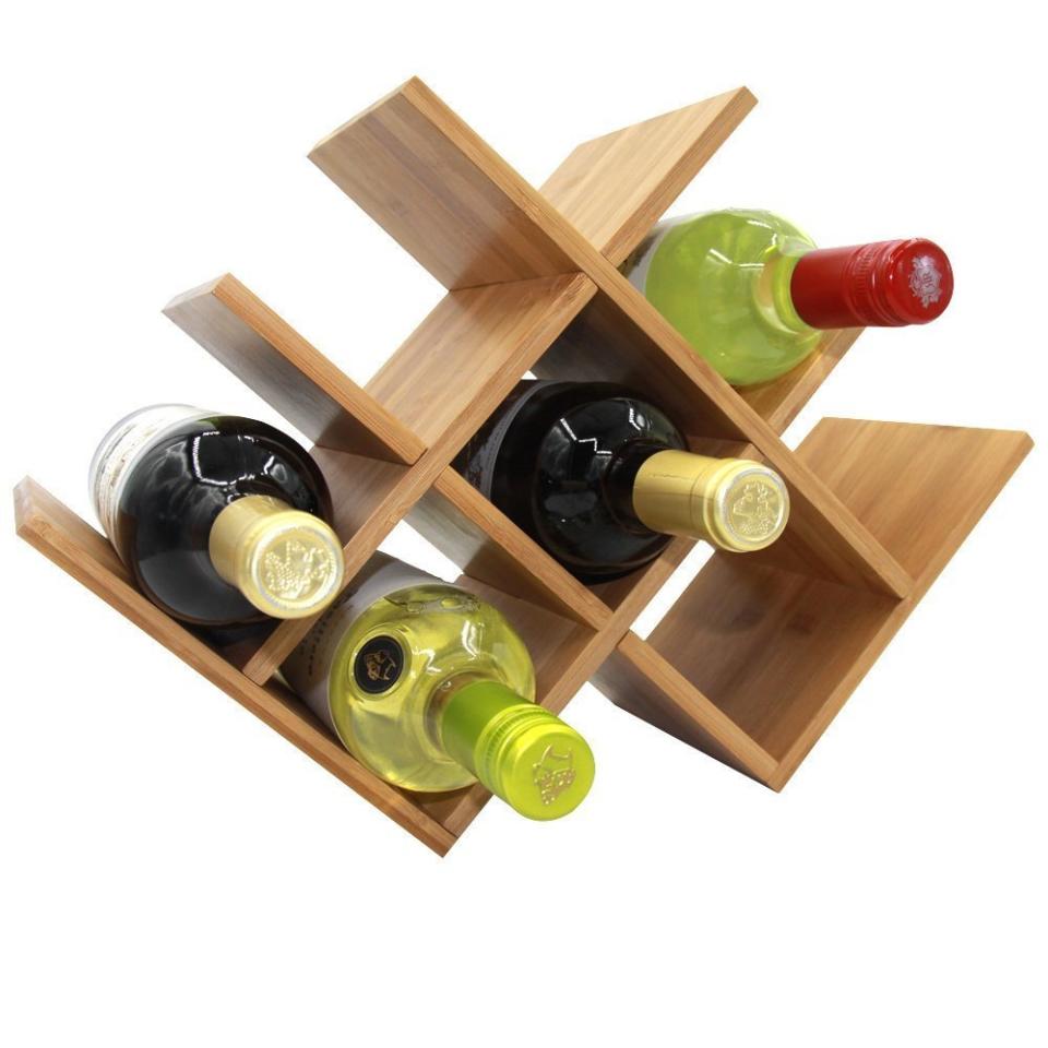 Even if you don't drink much wine, on those rare occasions when you have a bottle or two on hand for guests, you'll want a neat way to keep them organized rather than taking up a corner of your counter. Get this bamboo wine rack <a href="https://www.amazon.com/Autree-Natural-Bamboo-8-bottles-Countertop/dp/B0107RBJ1Y" target="_blank">here</a>.&nbsp;