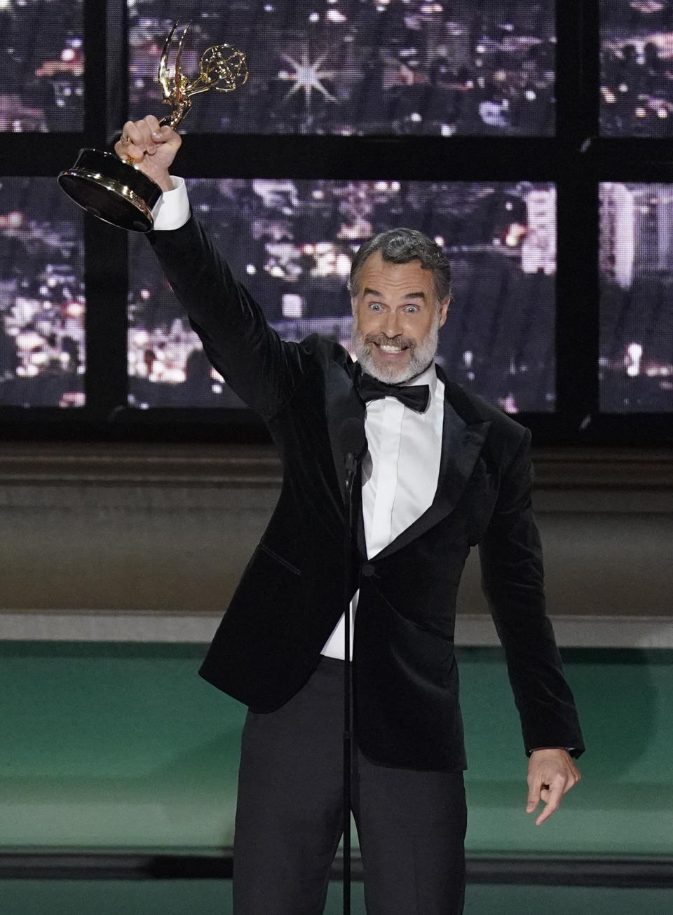 Murray Bartlett accepts the emmy for for outstanding supporting actor in a limited anthology series or movie for "The White Lotus" at the 74th Primetime Emmy Awards on Monday, Sept. 12, 2022, at the Microsoft Theater in Los Angeles. (AP Photo/Mark Terrill)