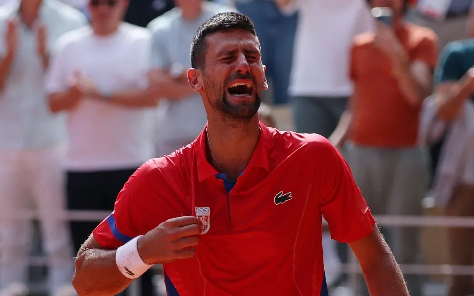 Djokovic celebrates winning the men's singles gold medal in the Olympics