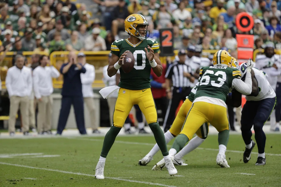 Green Bay Packers quarterback Jordan Love looks to throw during a preseason game Saturday, Aug. 26, 2023, in Green Bay, Wis. The former Utah State star is finally getting his chance to start for the Packers this season. | Mike Roemer, Associated Press