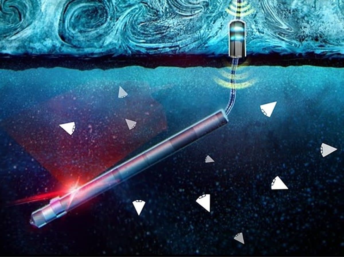 An illustration of tiny wedge-shaped robots – collectively known as Sensing With Independent Micro-Swimmers (SWIM) – deployed into the ocean miles below a lander on the frozen surface of an ocean world (Nasa)