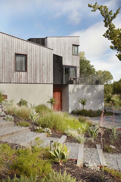 Cement plaster was used on the base of the exterior, with double-paned windows throughout.