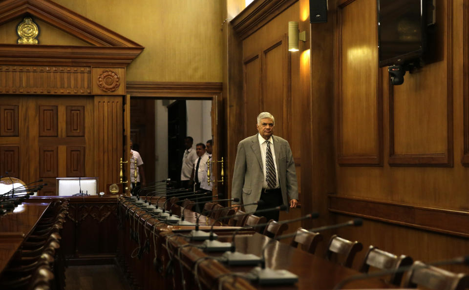 Sri Lankan Prime Minister Ranil Wickremesinghe arrives for an interview with the Associated Press at his office in Colombo, Sri Lanka, Thursday, April 25, 2019. Wickremesinghe has acknowledged to The Associated Press that minority Ahmadi Muslims who are refugees from Pakistan have faced attacks since the Easter bombings. He said Thursday that security forces were trying to help the Ahmadis. (AP Photo/Eranga Jayawardena)