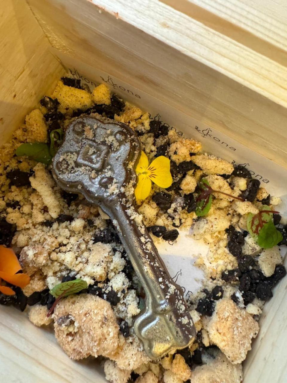 News Shopper: A box contained the ornate key Mary finds, made from decadent chocolate, to unlock the gate.